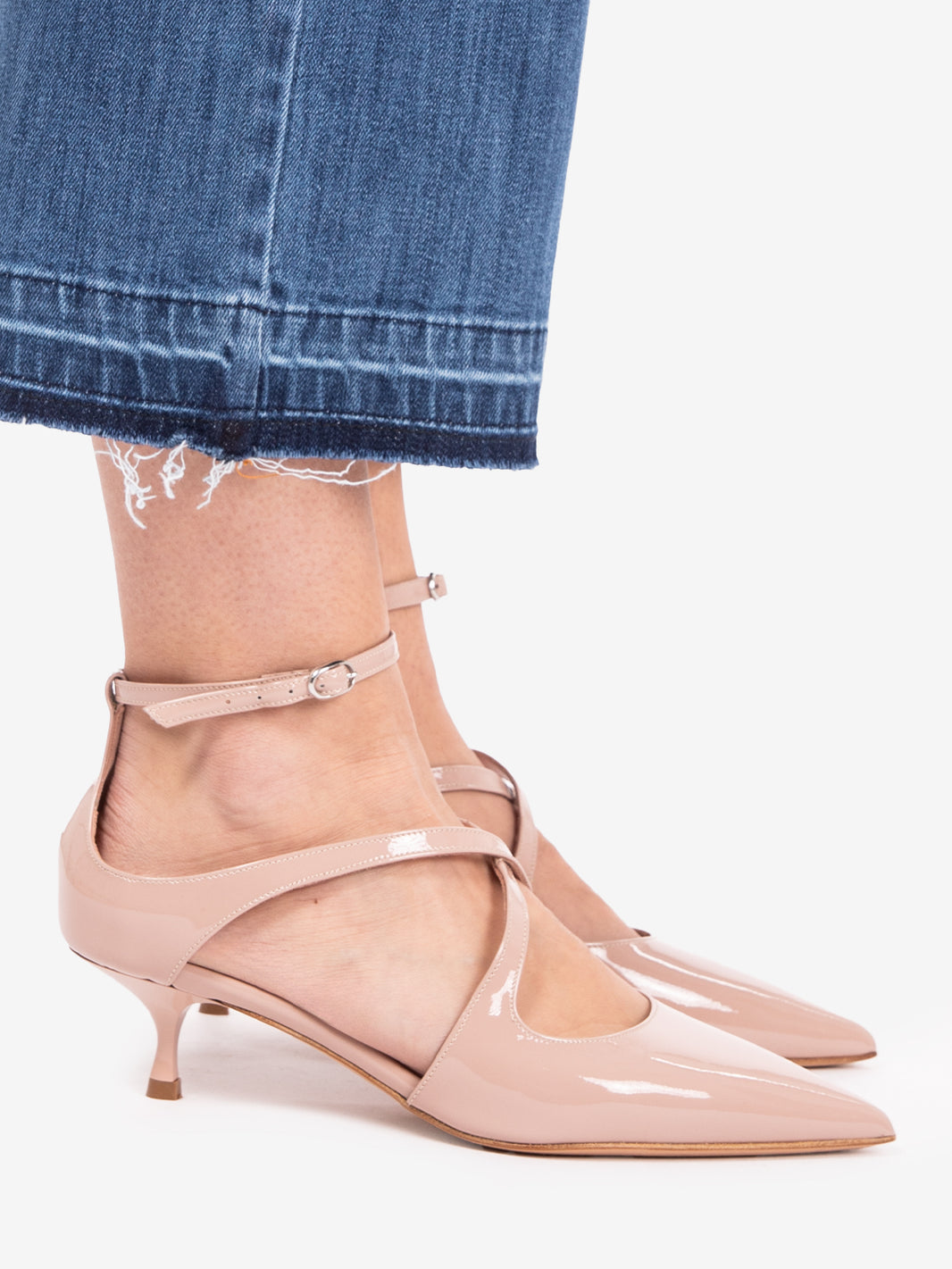 Chanel in vernice con incrocio beige