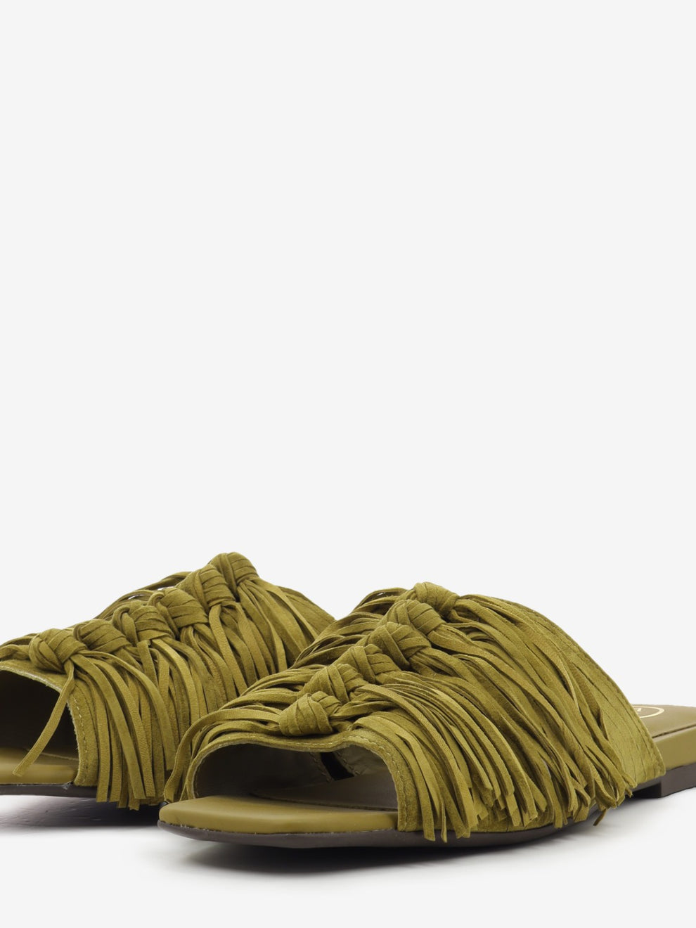 Green suede mule with fringe