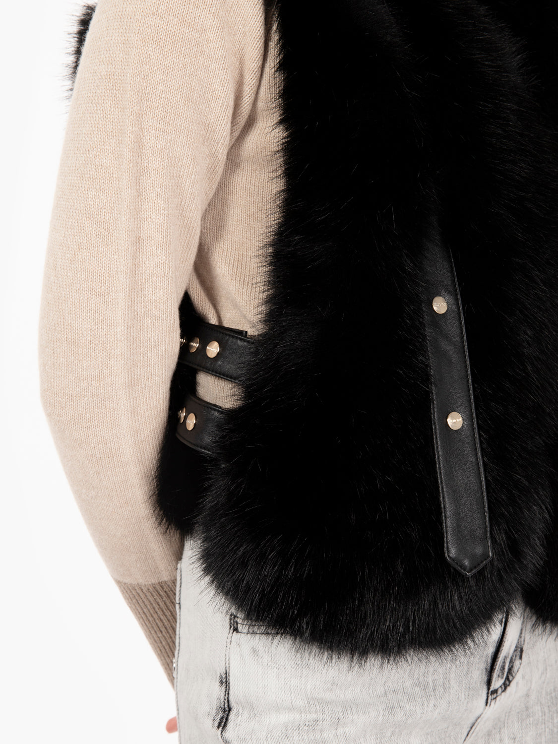 Faux fur vest with black straps