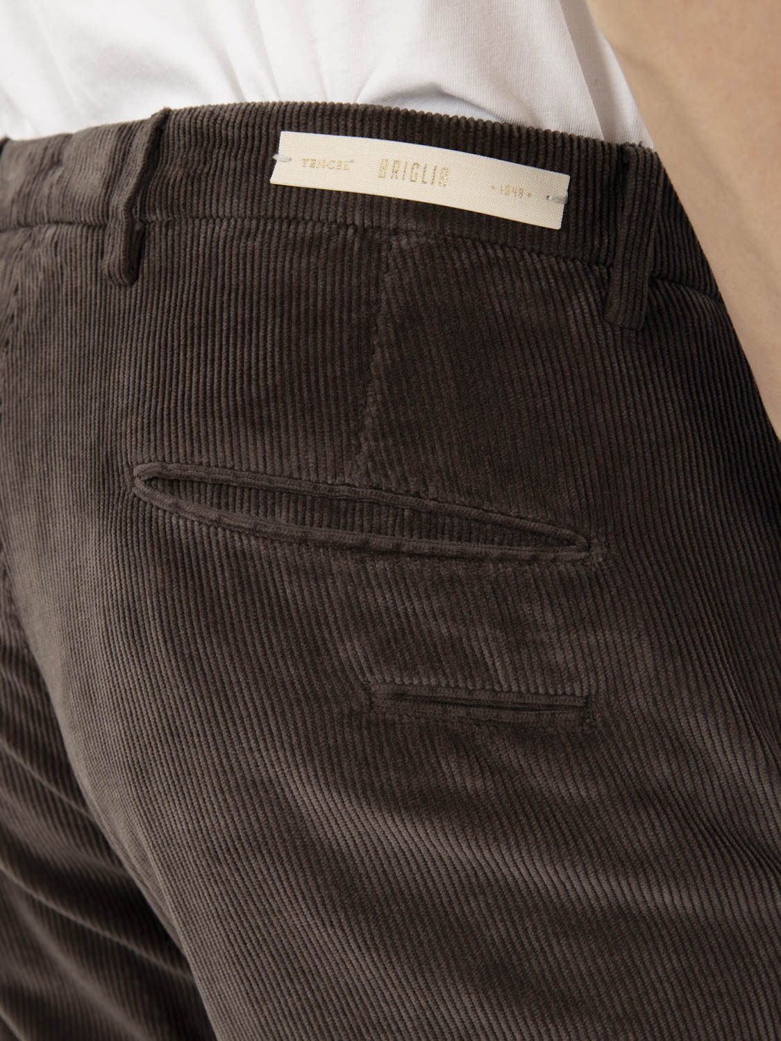 Pantaloni con balza in velluto camoscio