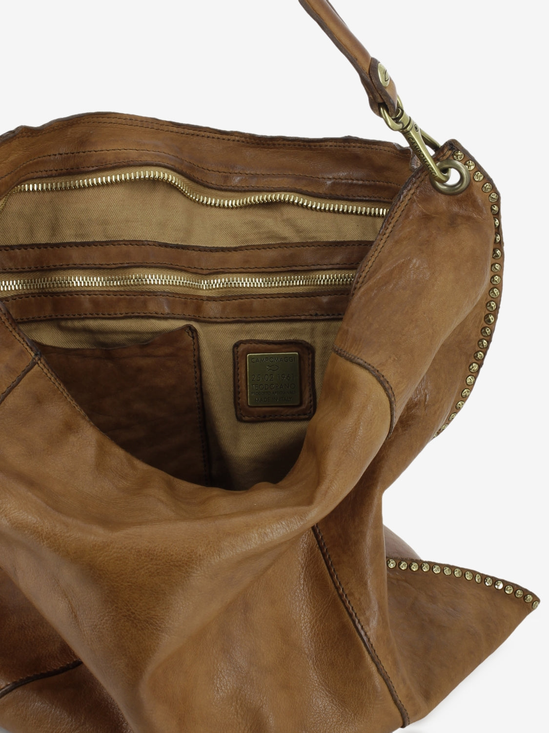 Elsa studded leather shoulder bag in cognac