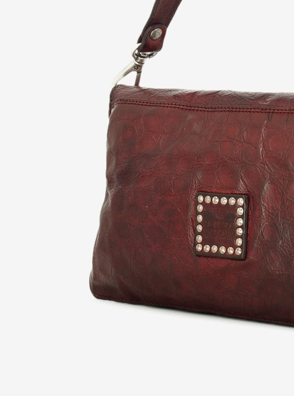 Agnese crossbody bag in wine-colored crocodile-print leather