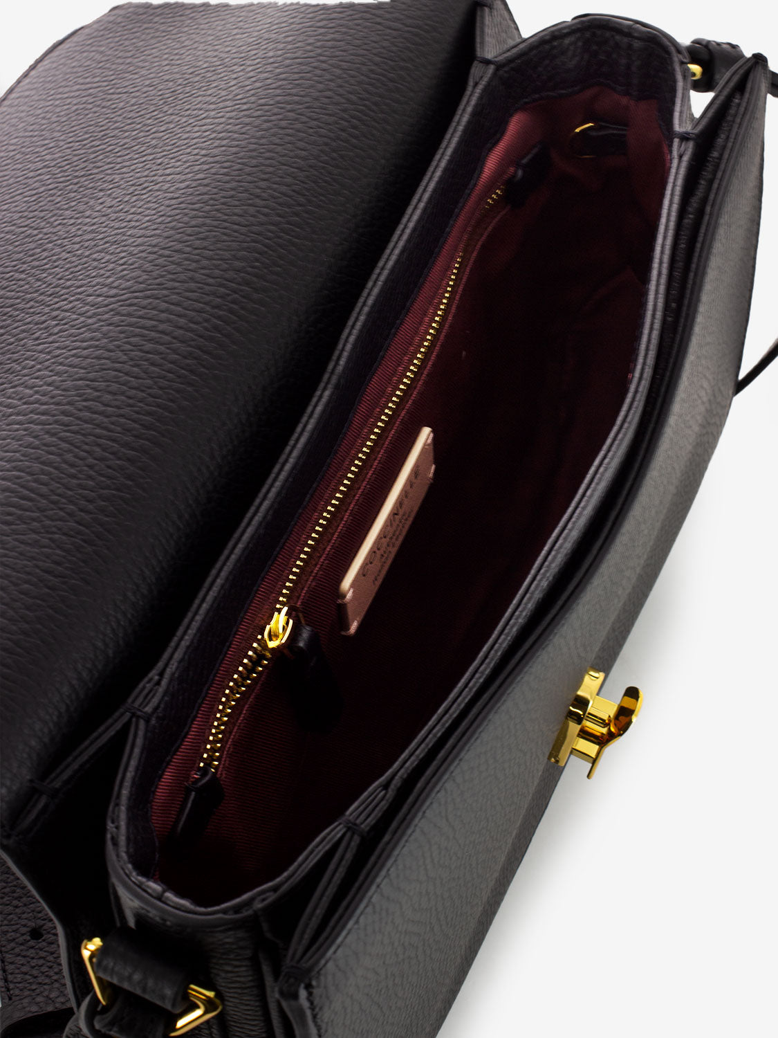 Borsa a tracolla con clip in pelle martellata nera