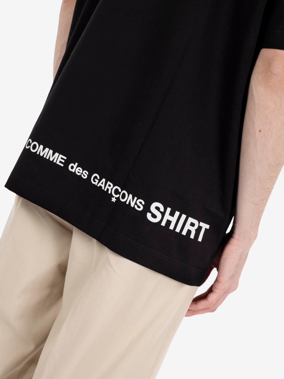 T-shirt over black