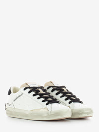 Distressed white / black sneakers