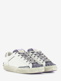 Distressed white sneakers