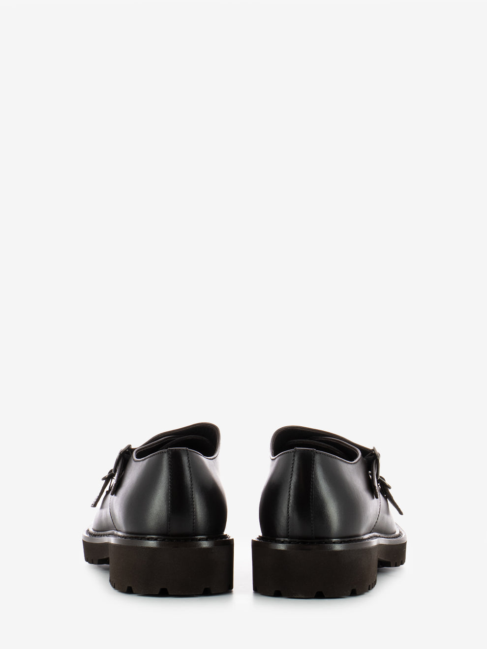 Double buckle moccasins with dark brown trim