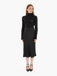 Black ribbed knit and satin dress