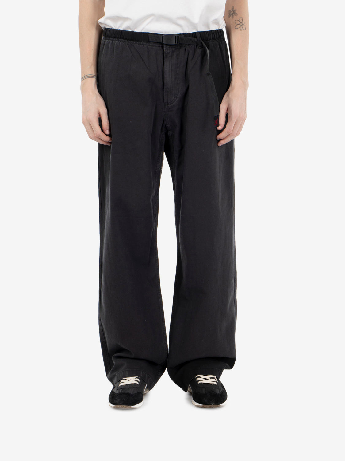 Loose black trousers