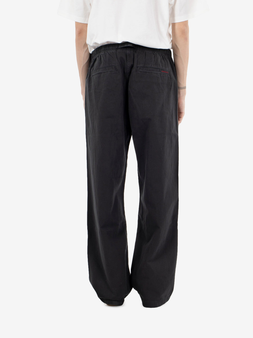 Loose black trousers