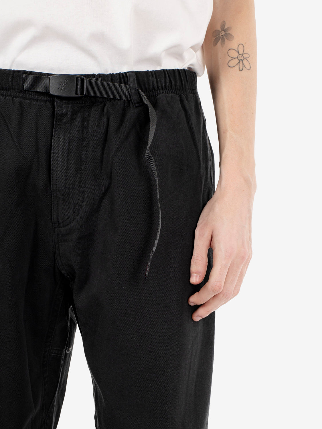 Loose black trousers