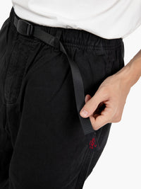 Loose black trousers