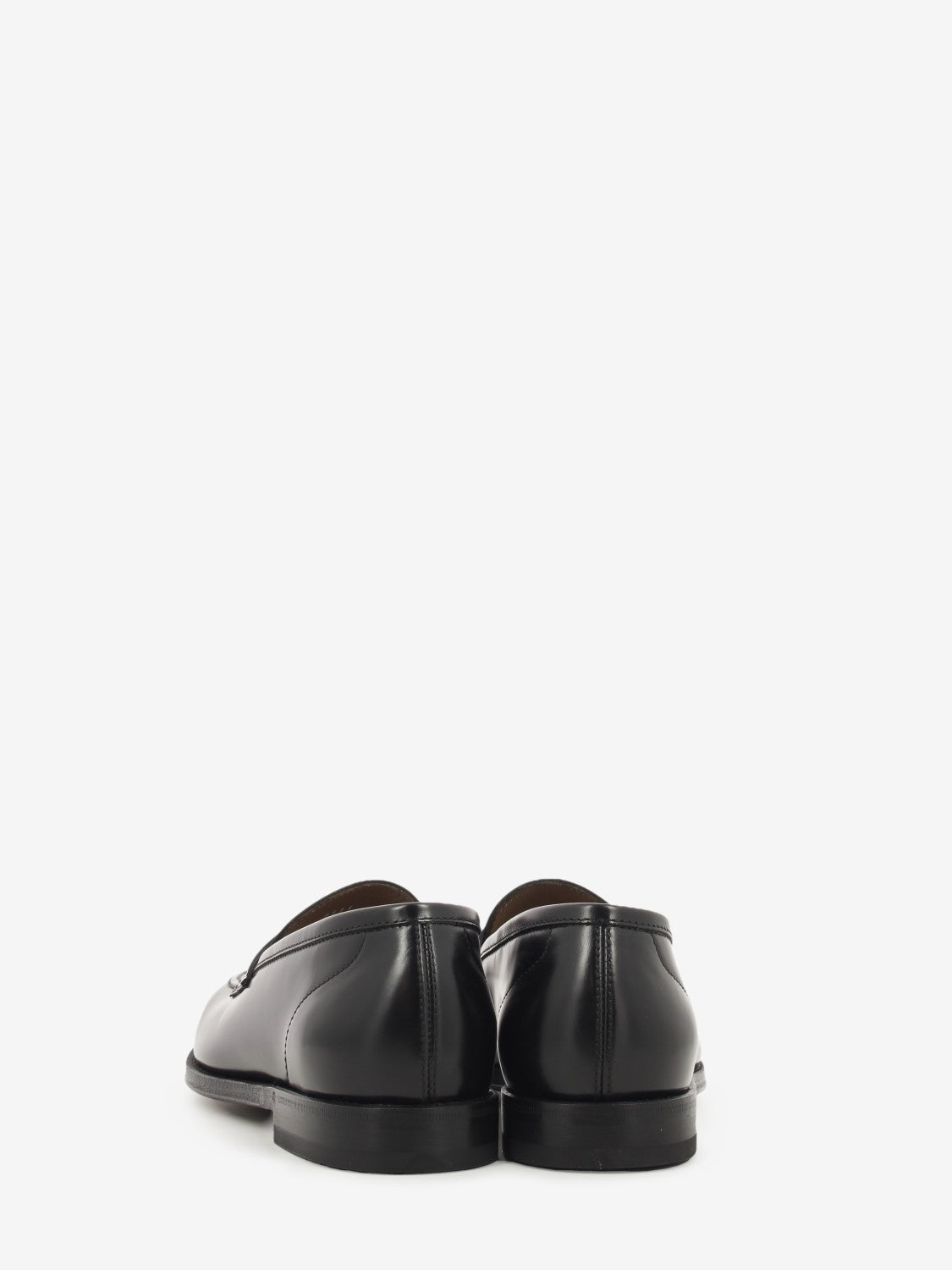 Black polished leather loafers