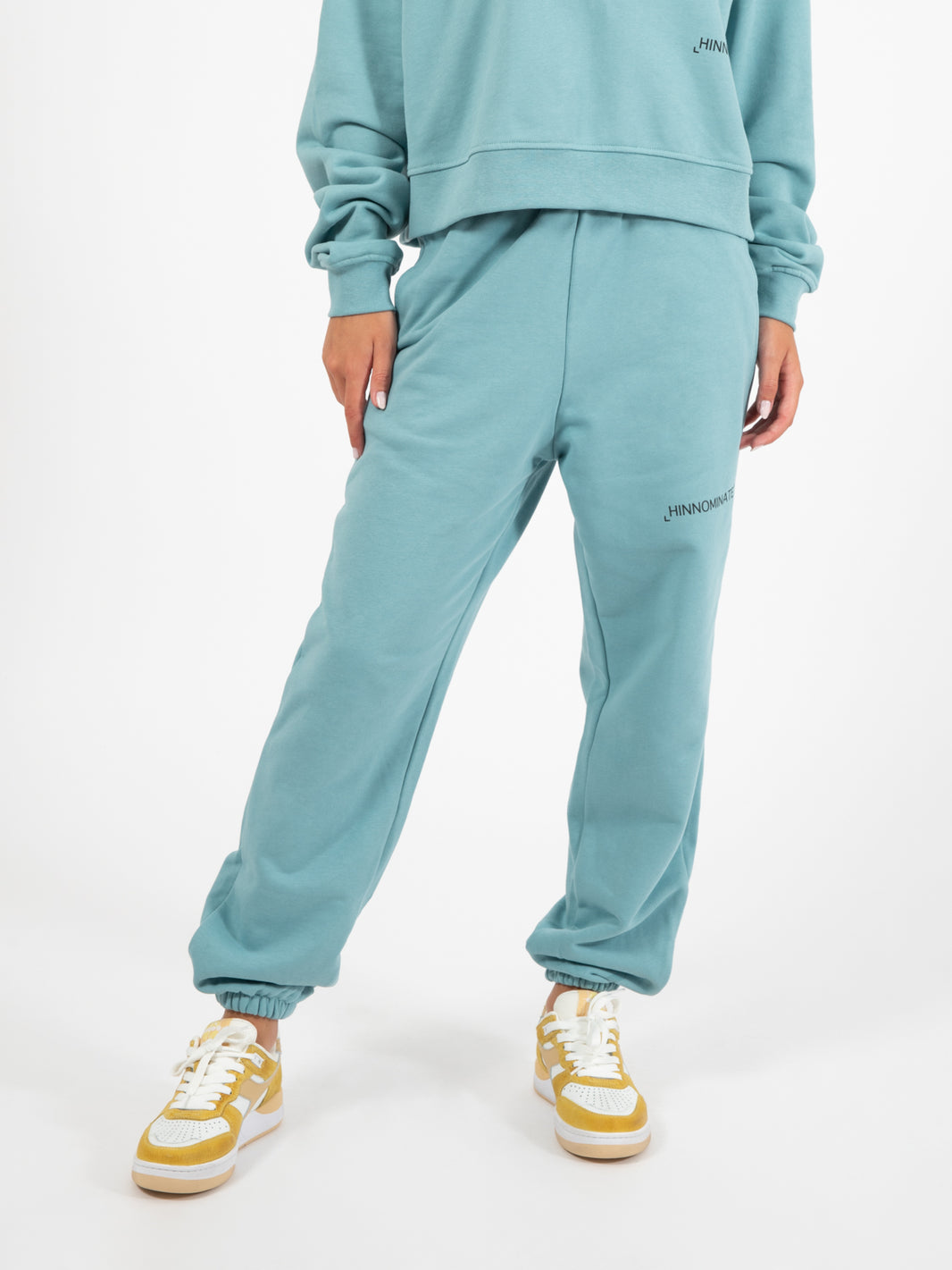 Jogger in felpa con stampa parrot