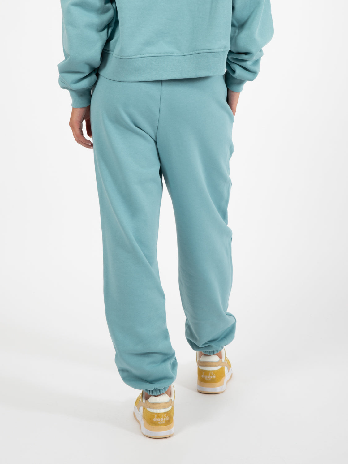 Jogger in felpa con stampa parrot