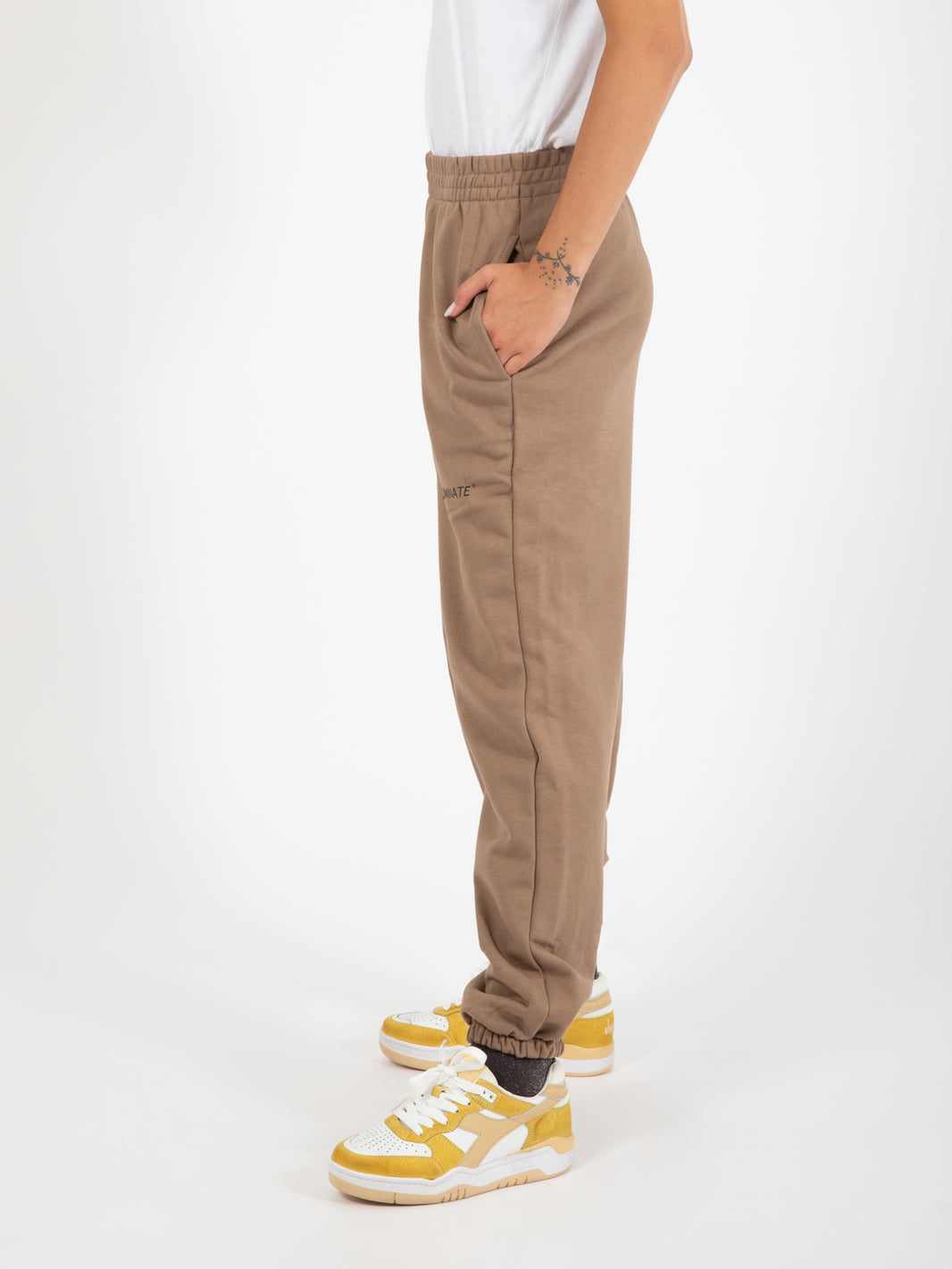 Jogger in felpa con stampa tortora