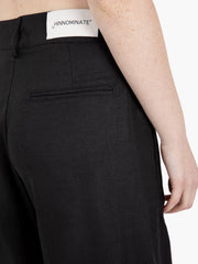 HINNOMINATE - Pantalone largo in lino nero