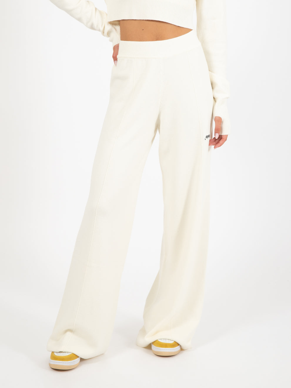 Pantalone palazzo con nervature e ricamo bianco burro