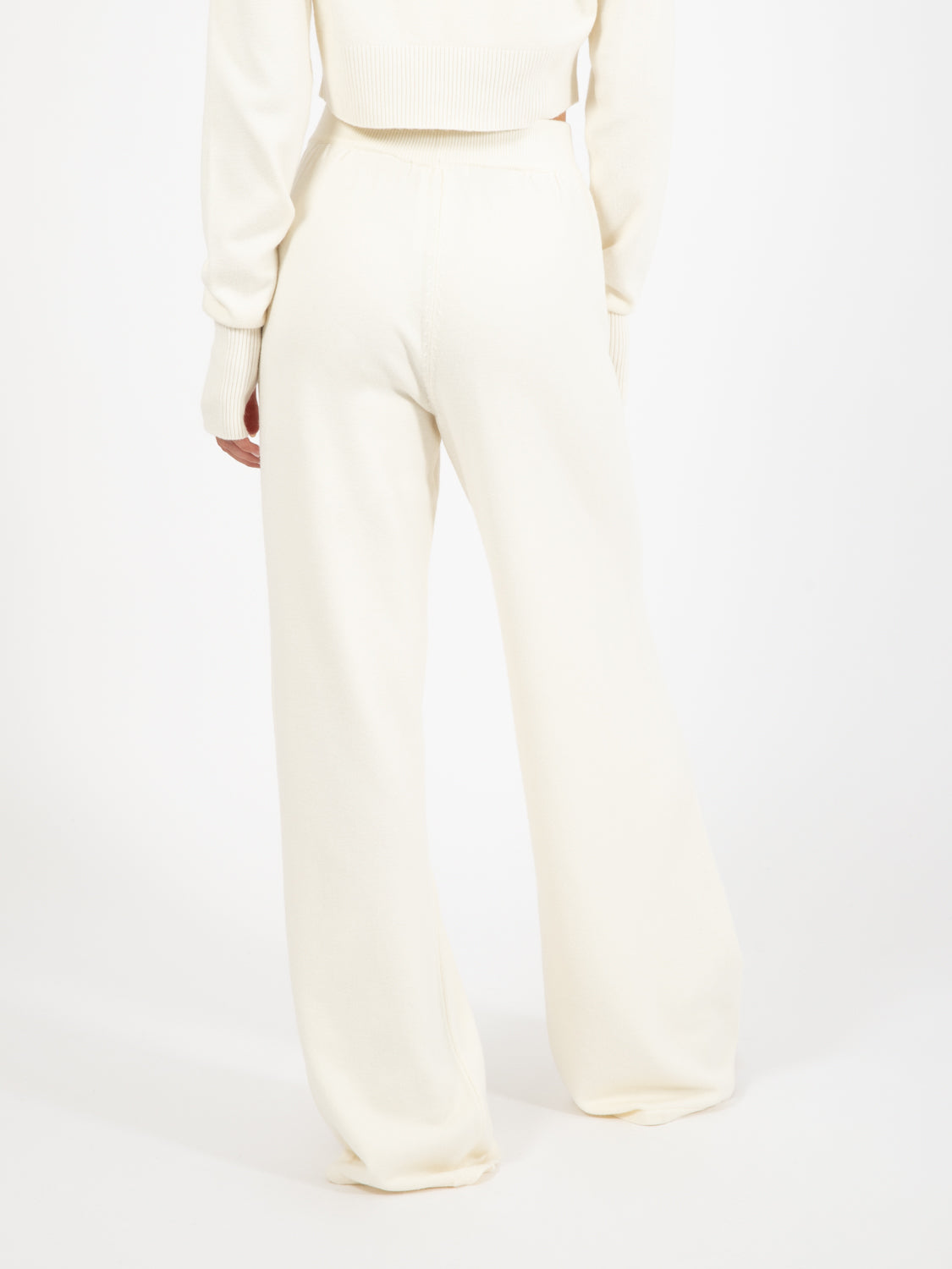 Pantalone palazzo con nervature e ricamo bianco burro