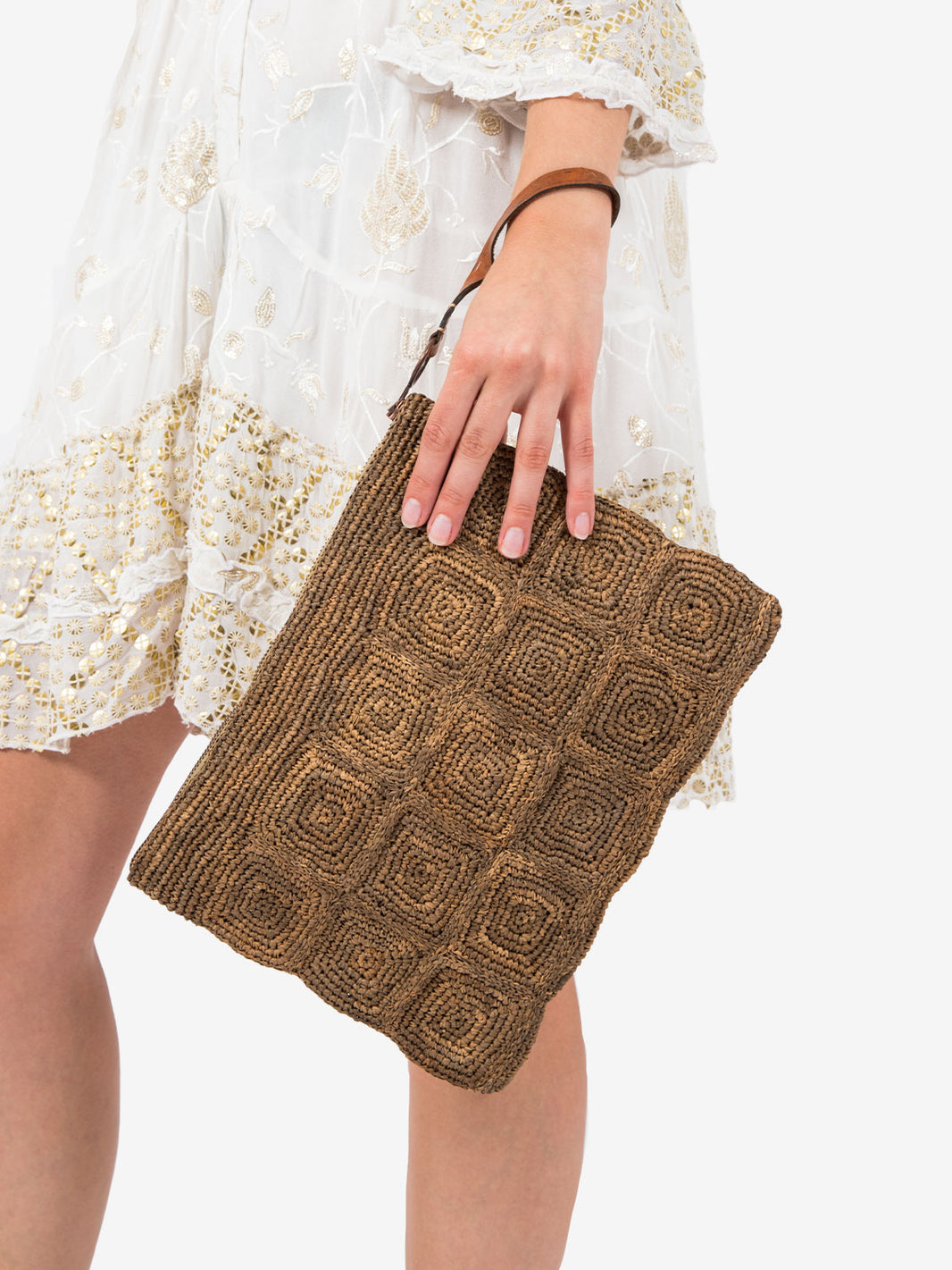 Tanala clutch bag in dark tea raffia