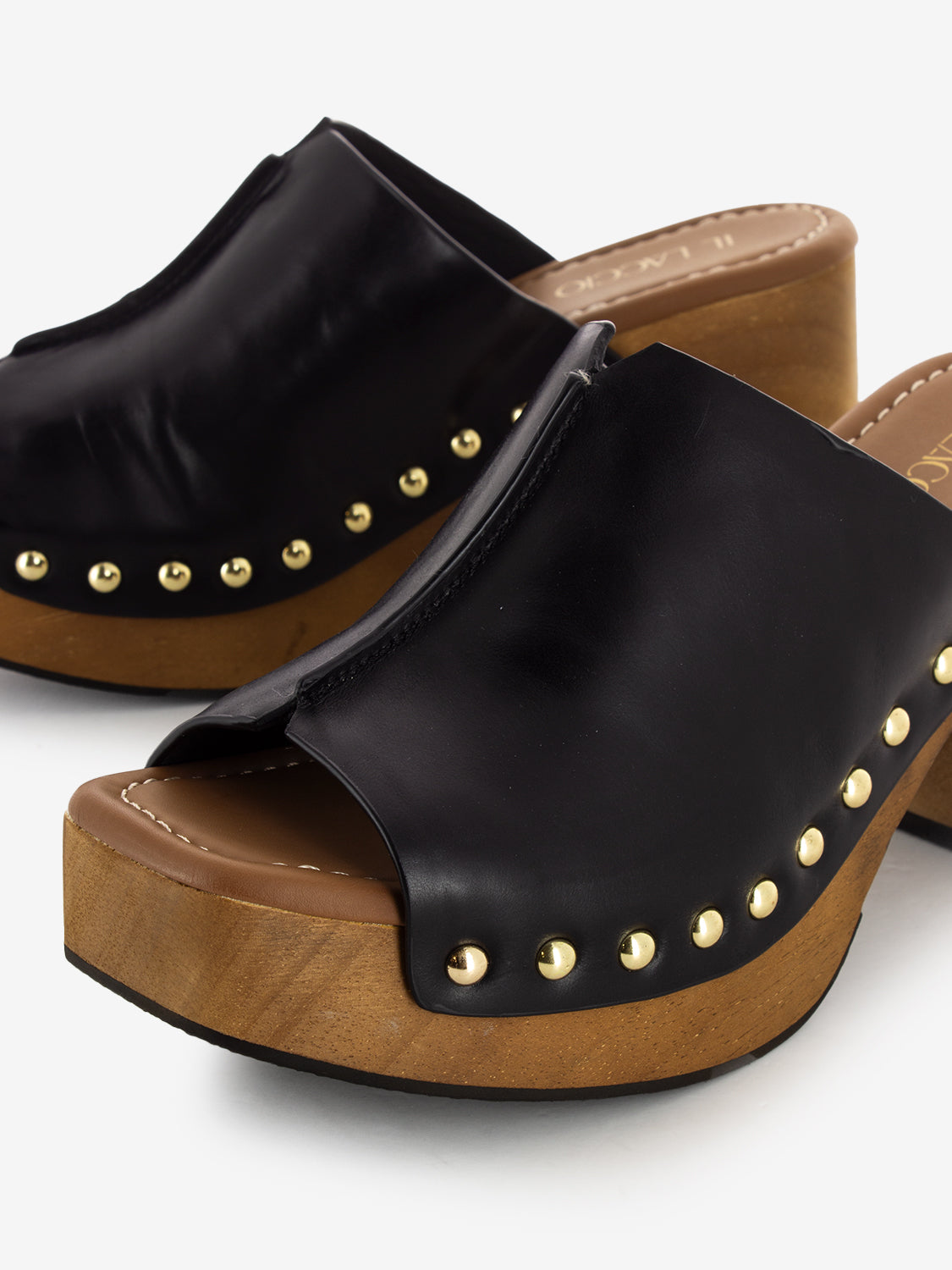 Black leather clogs with rivets