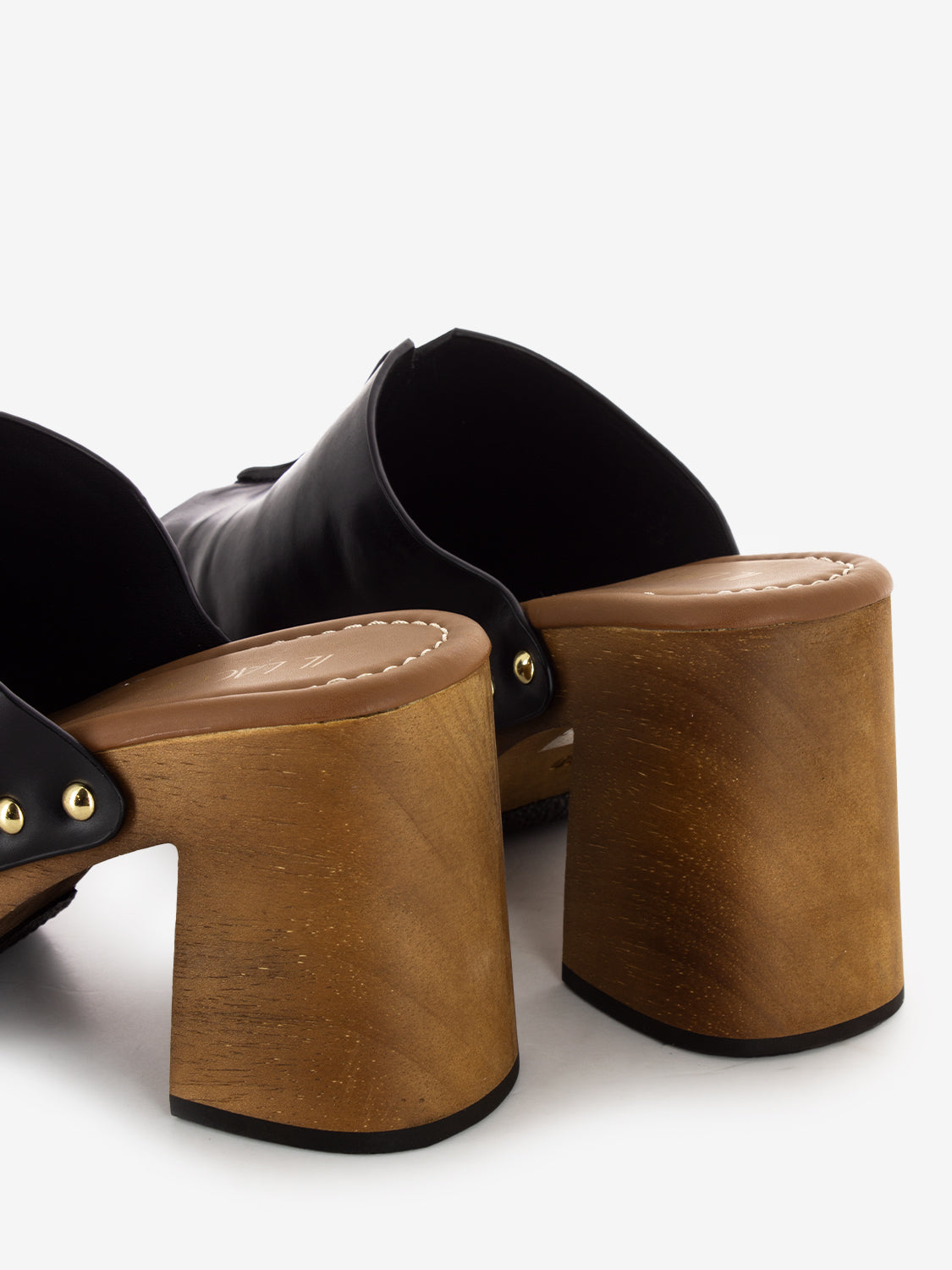 Black leather clogs with rivets