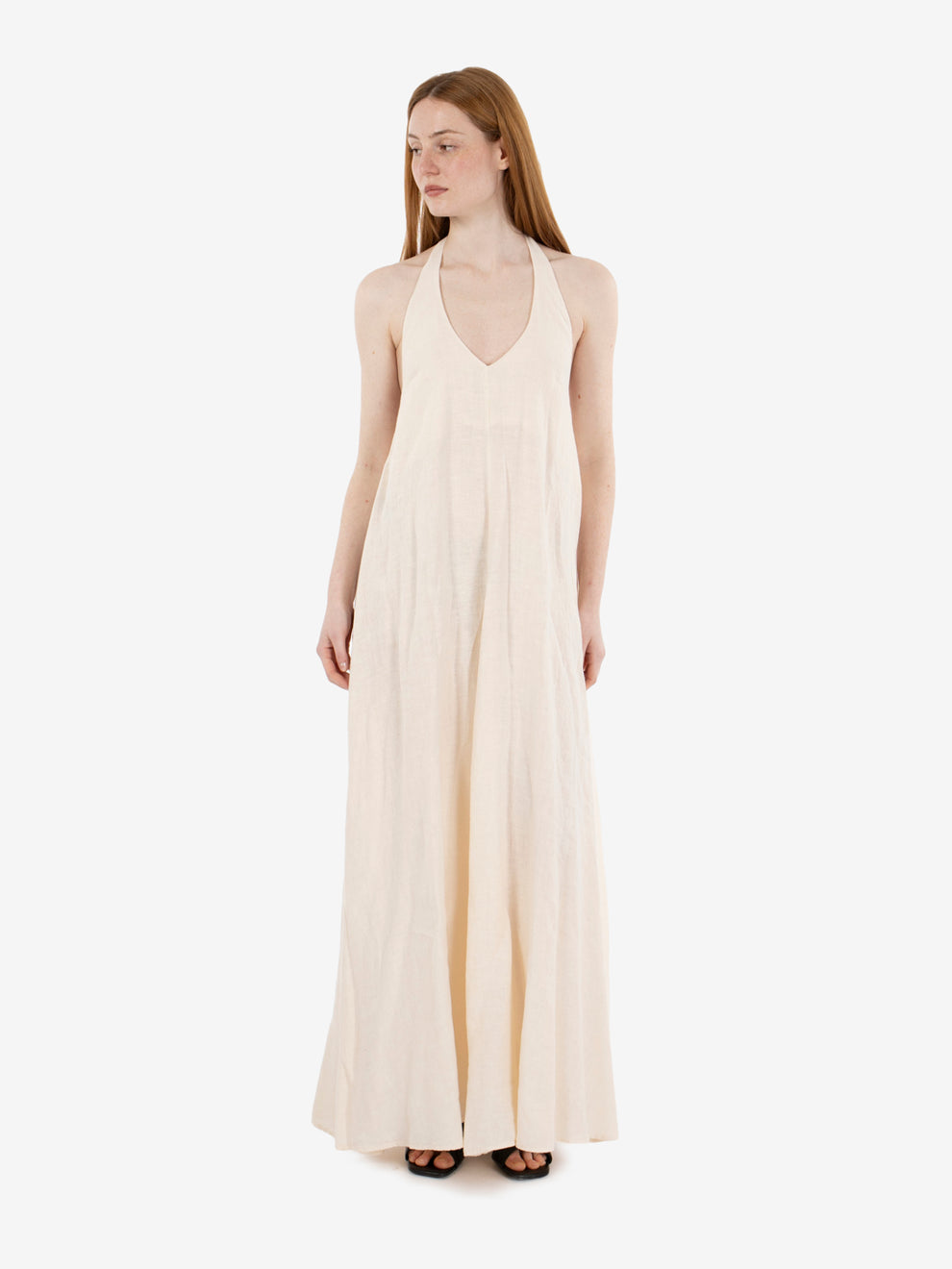 Long dress with halter neckline in butter color