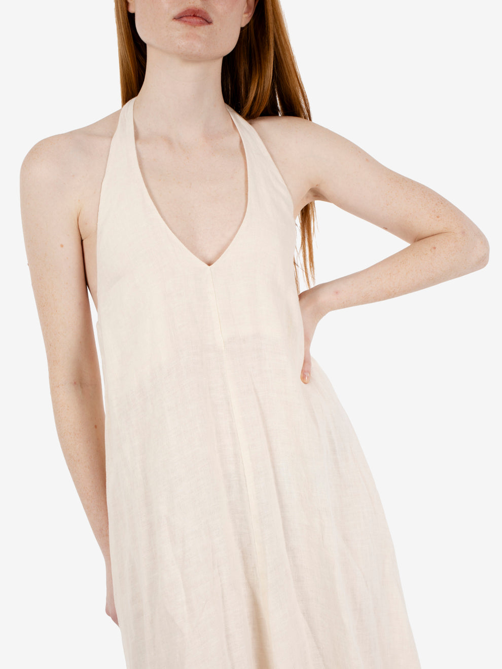 Long dress with halter neckline in butter color