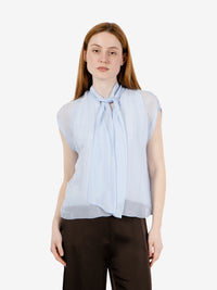 Blusa senza maniche con fiocco azzurro