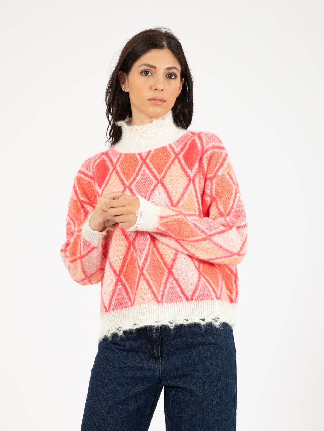 Maglione a collo alto rosa / bianco con rombi