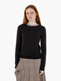 Maglione con pietrine nera