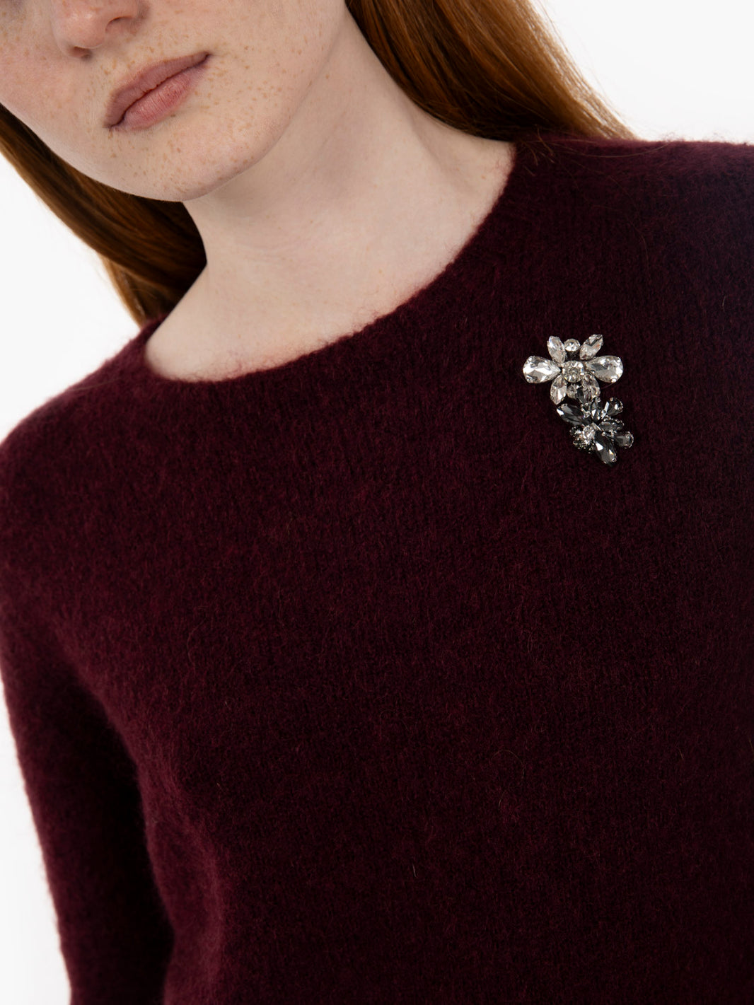 Burgundy crew neck sweater with brooch