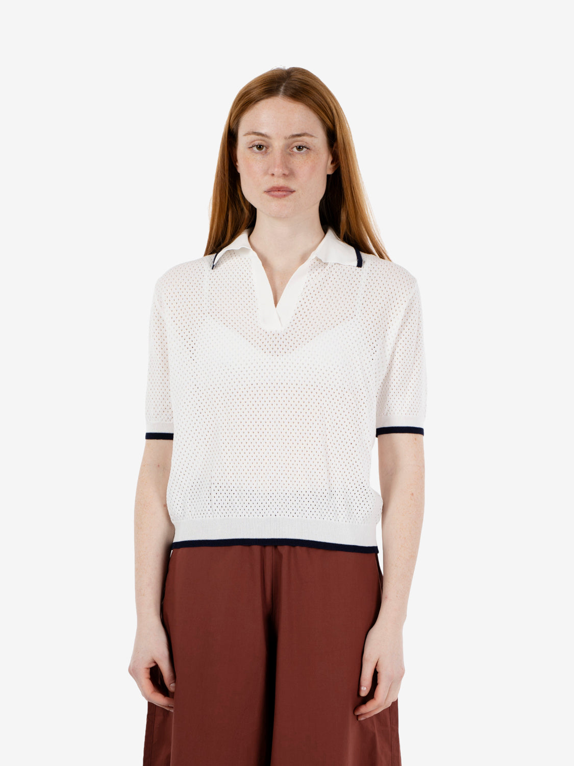 Polo traforata bianca