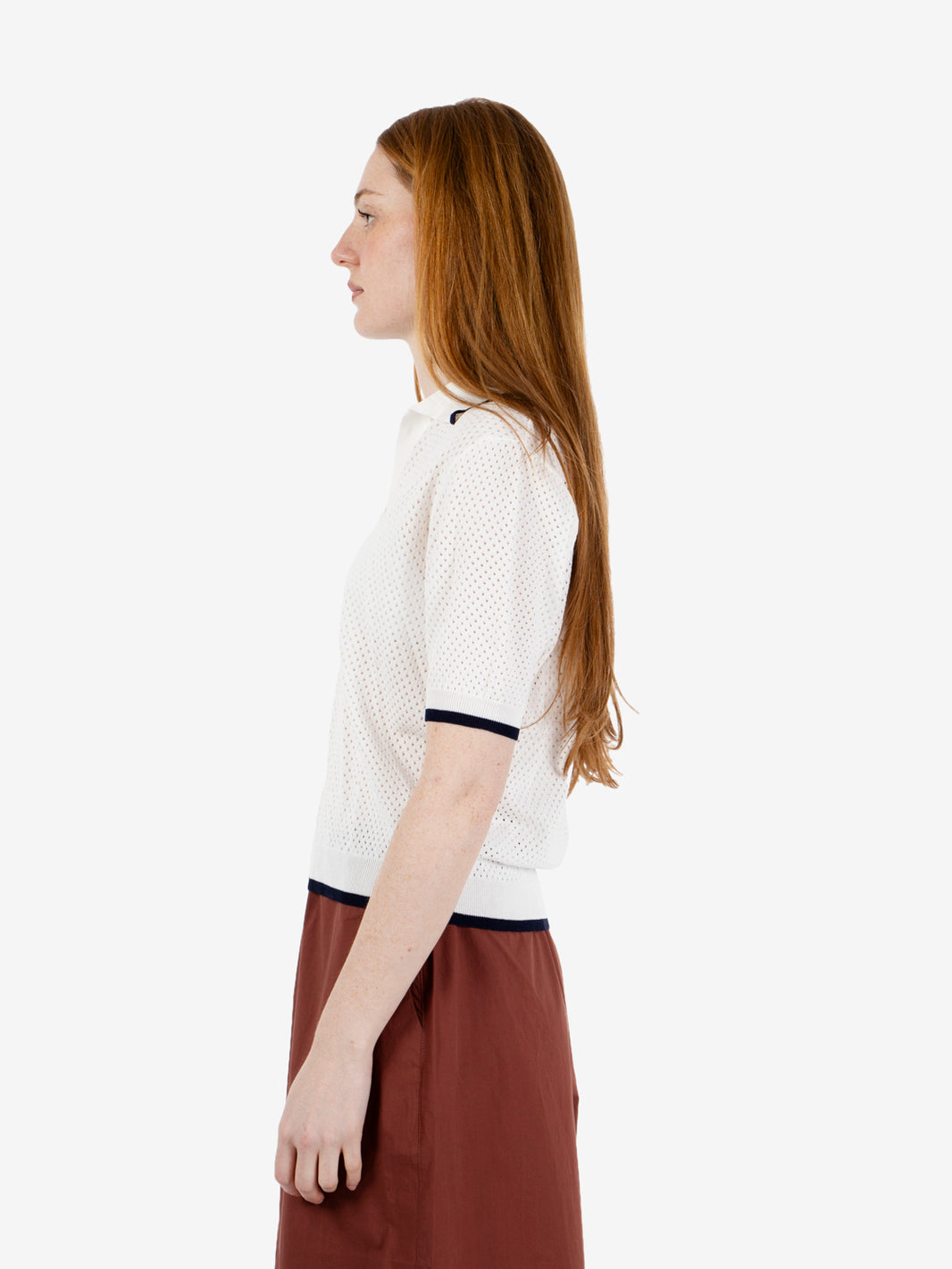 Polo traforata bianca