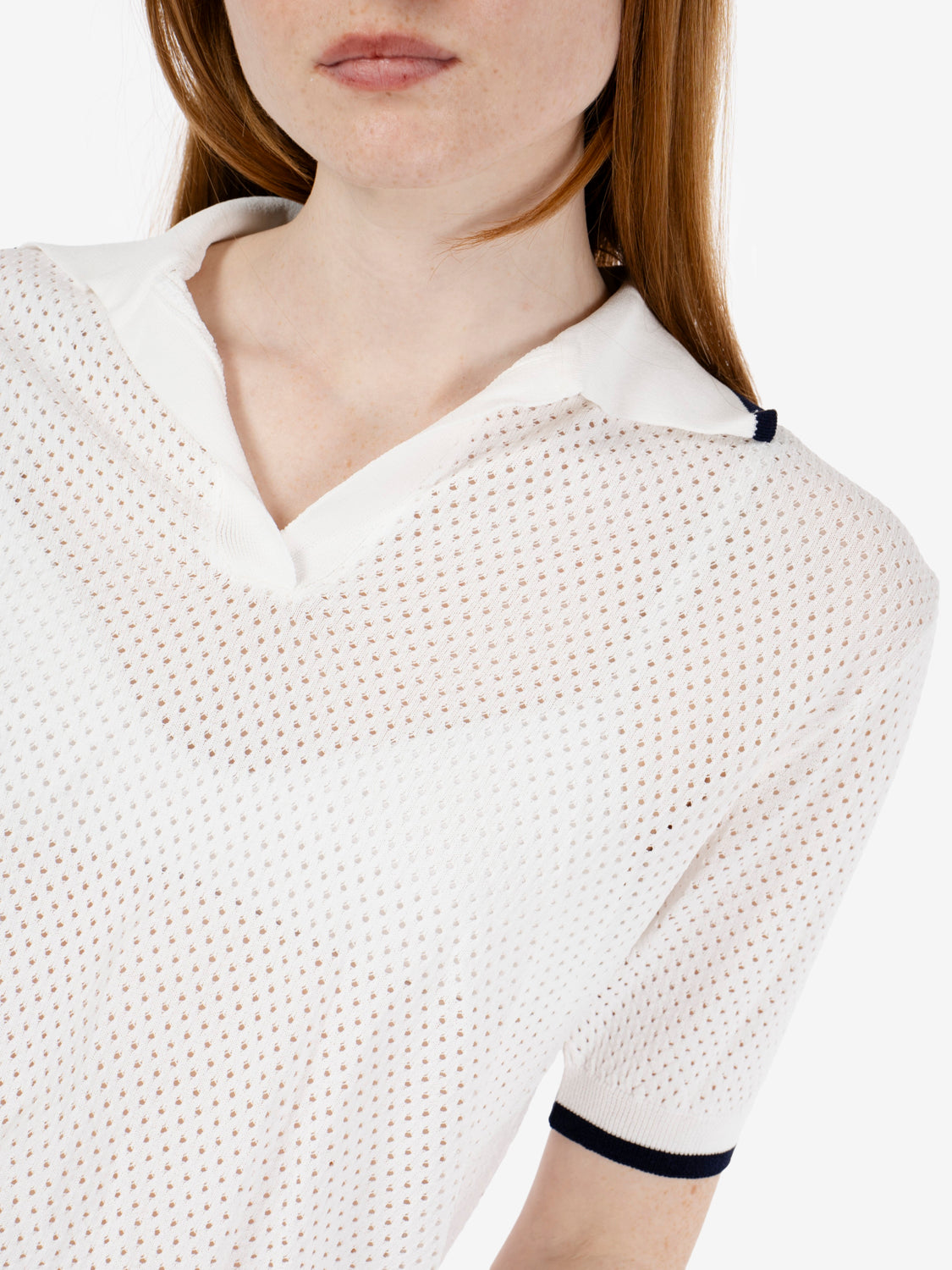 Polo traforata bianca