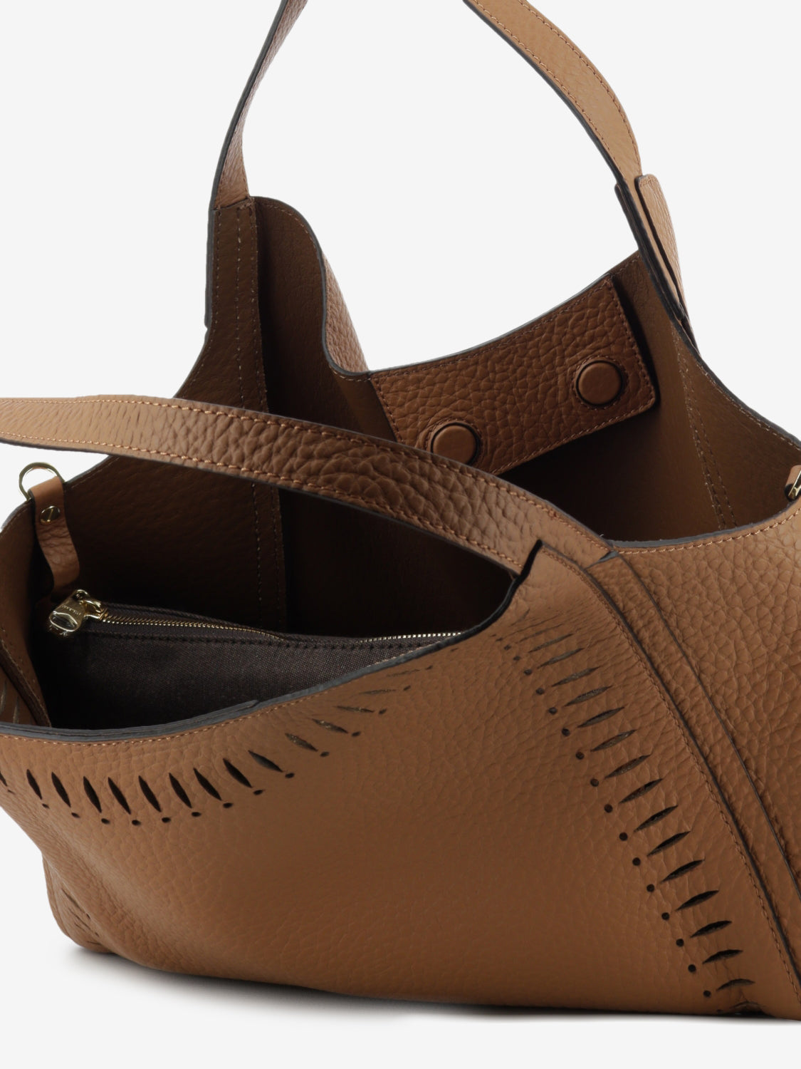 Perforated leather bag in tan