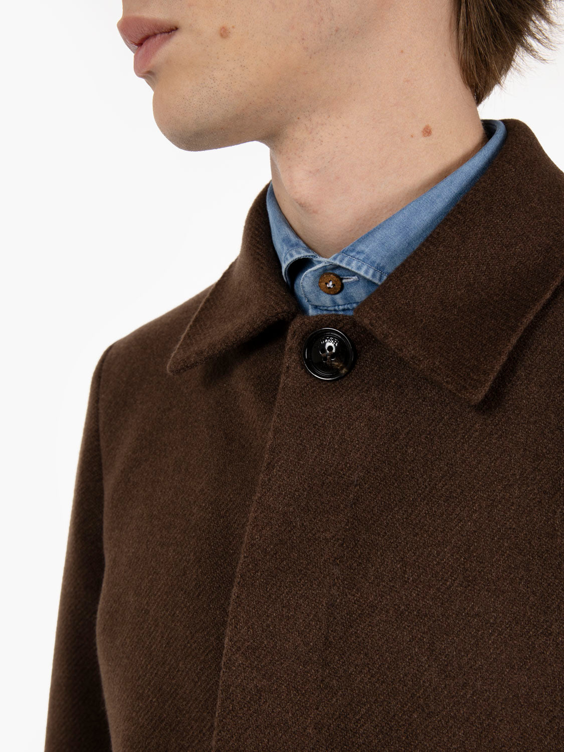 Long single-breasted dark brown coat