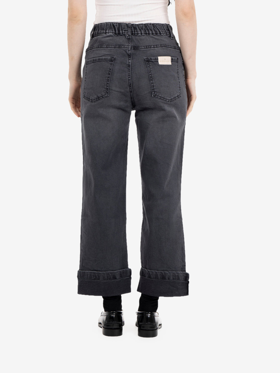 Jeans con risvolto in denim nero