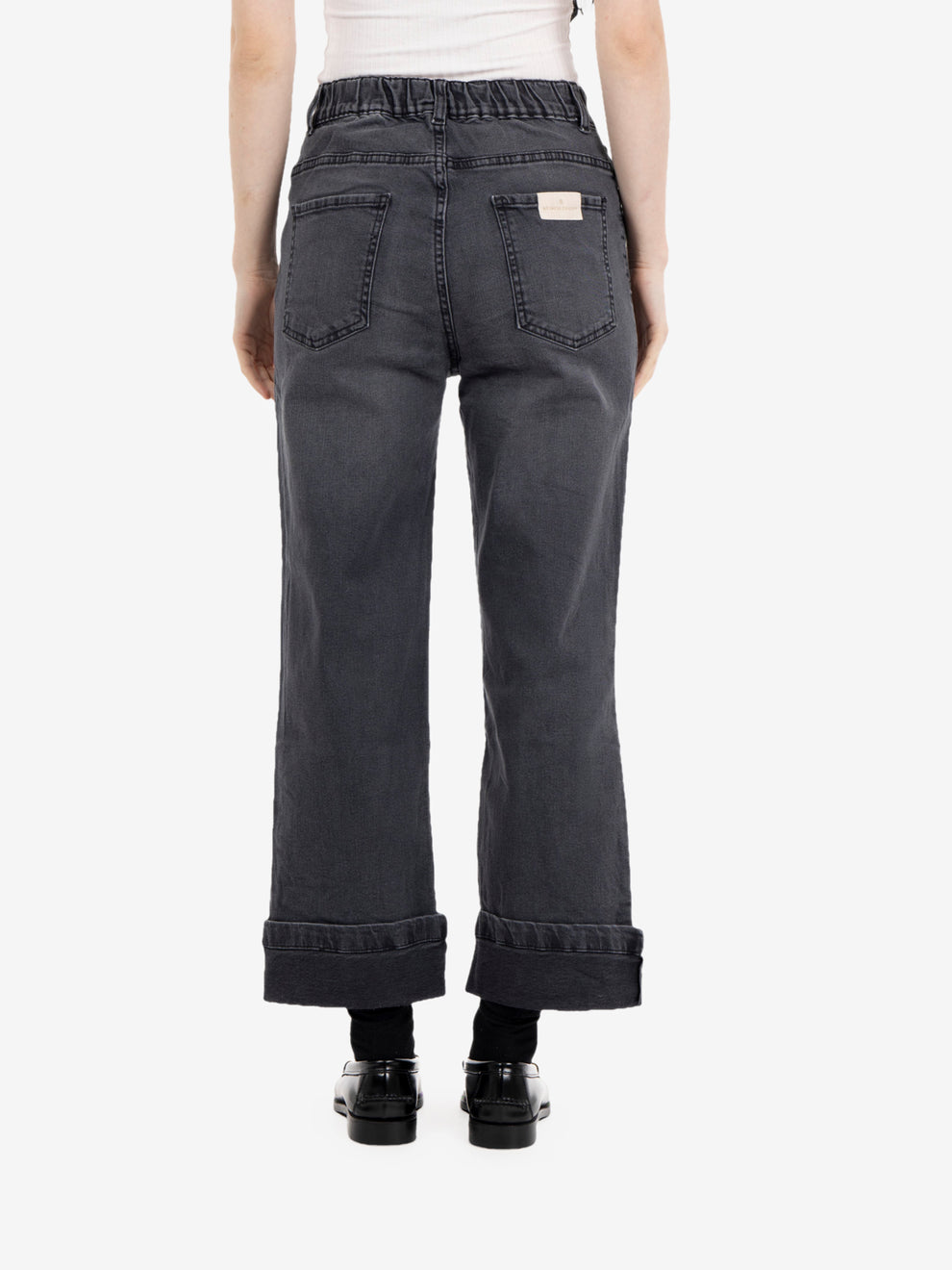 Jeans con risvolto in denim nero