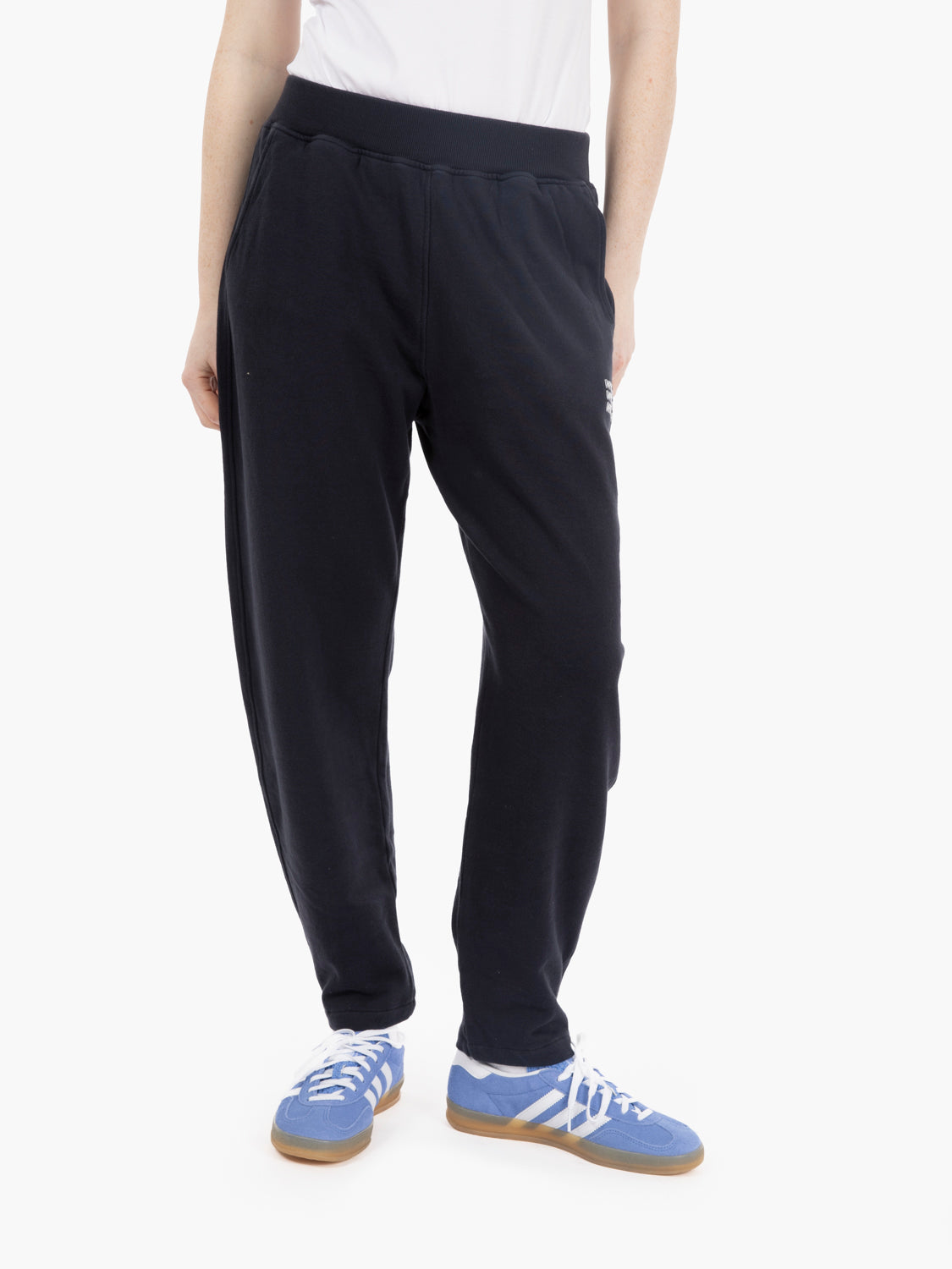 Pantaloni con pinces sul fondo blu