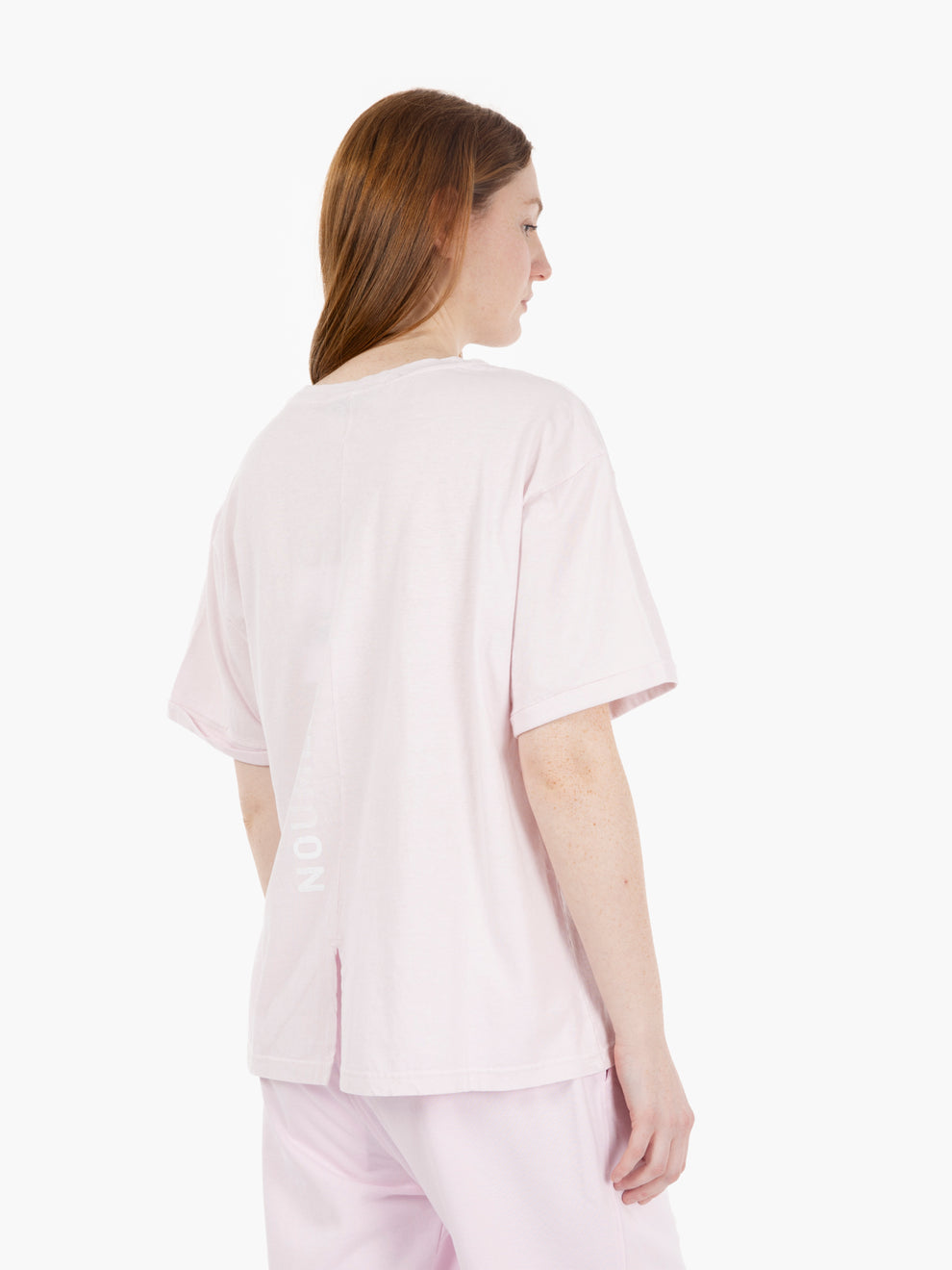 T-shirt girocollo con spacco e grafica sul retro rosa