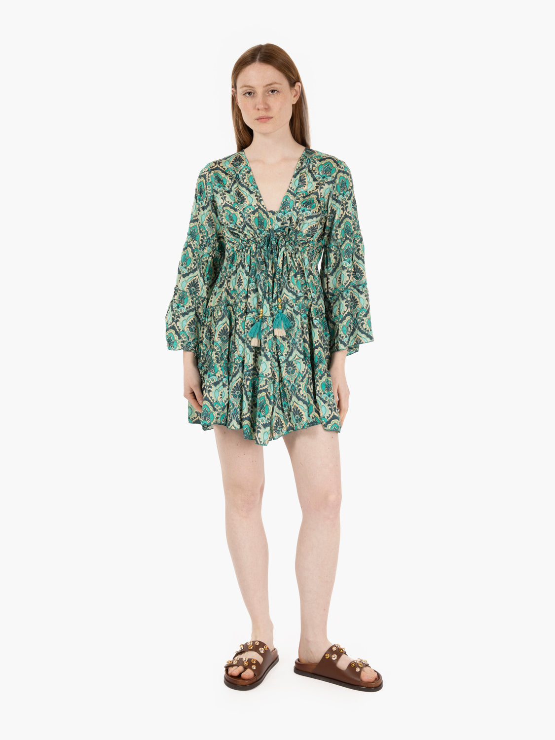Short dress in green patterned silk
