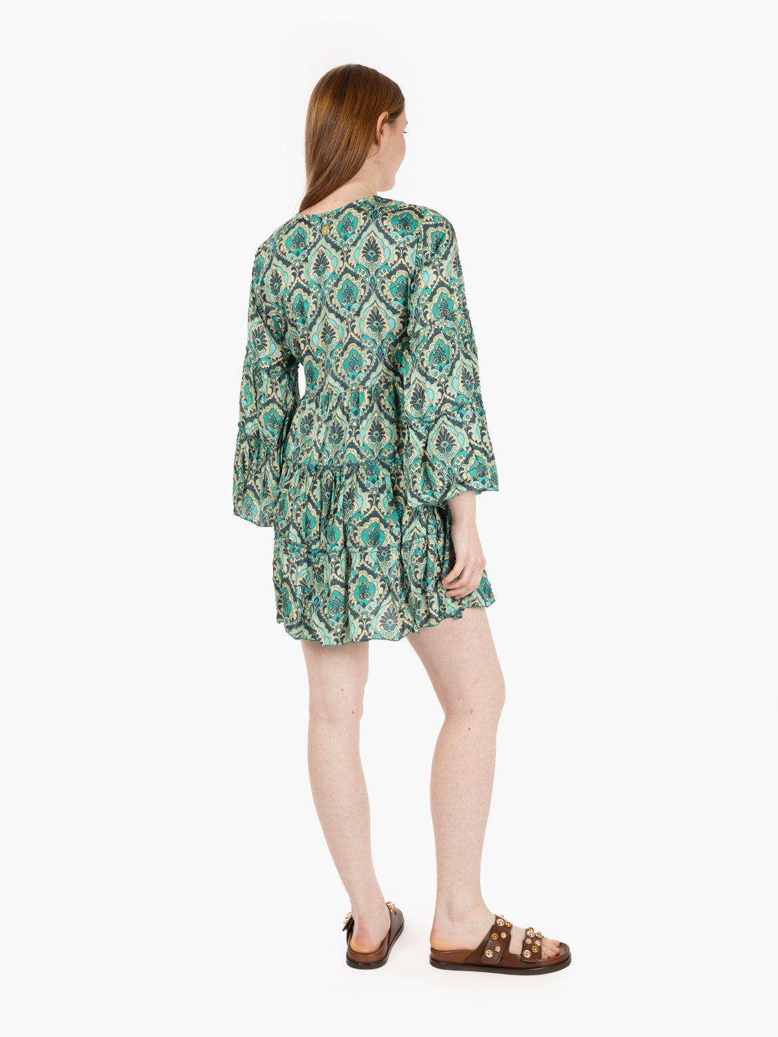 Short dress in green patterned silk