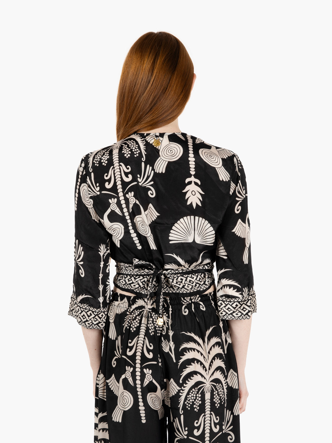 Black patterned crossover top