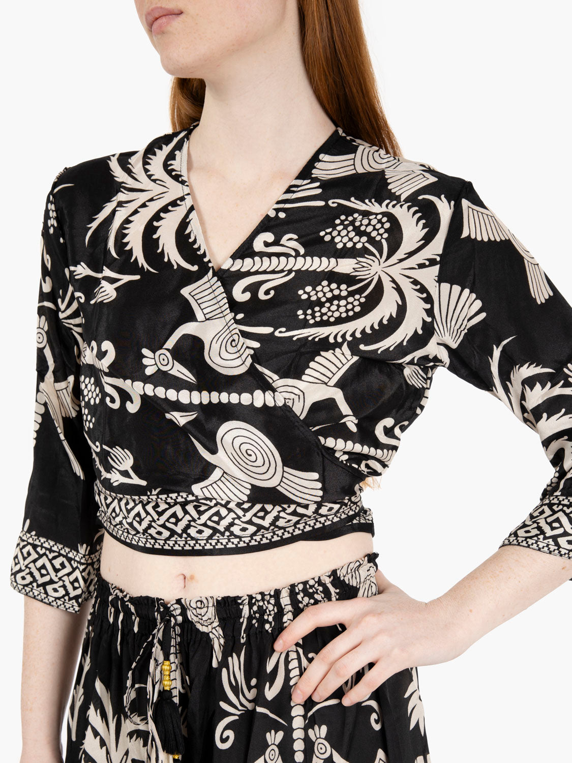 Black patterned crossover top