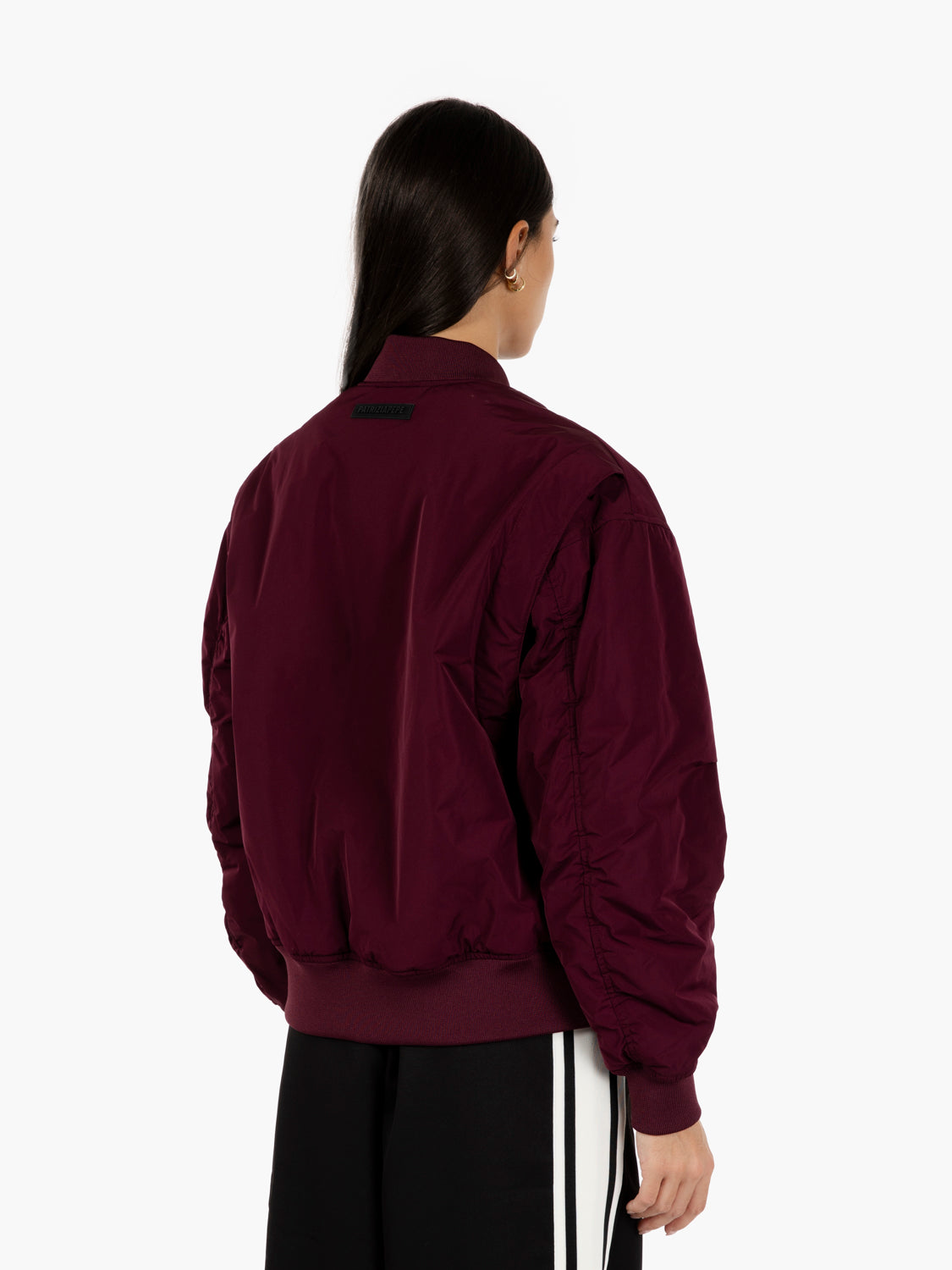 Purple bomber jacket with oversized sleeves