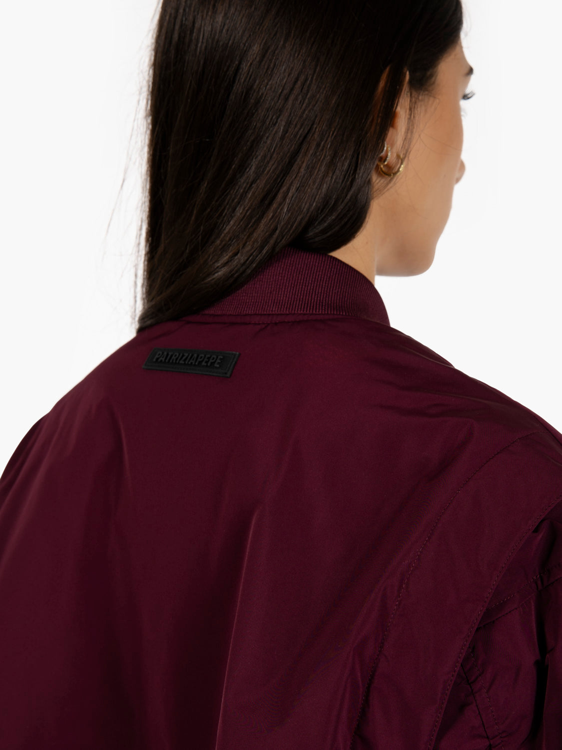 Purple bomber jacket with oversized sleeves