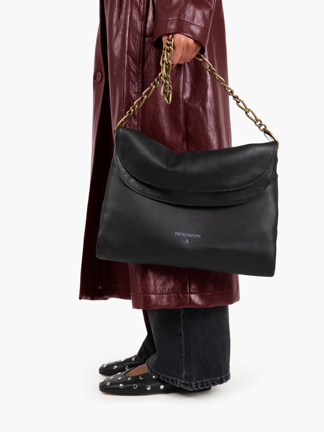 Leather bag with double flap and black chain
