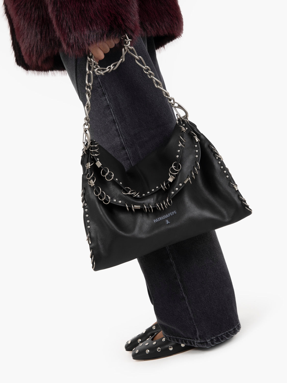 Borsa Radical Boho con piercing nera