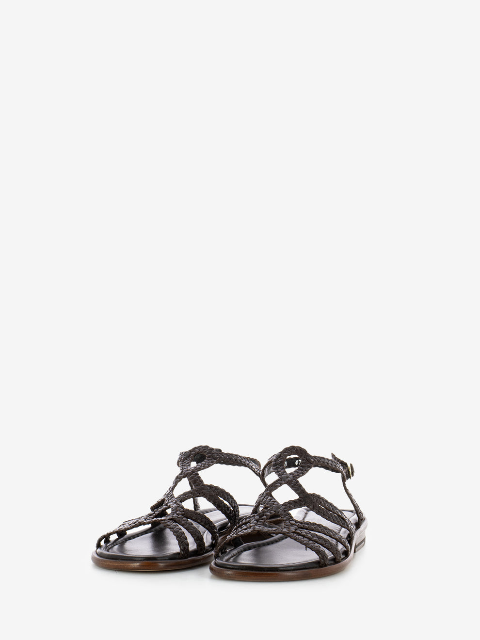 Flat sandals in woven leather coffee